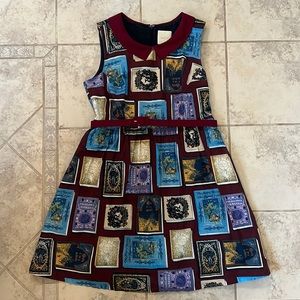 A-line Peter Pan collar book-print midi